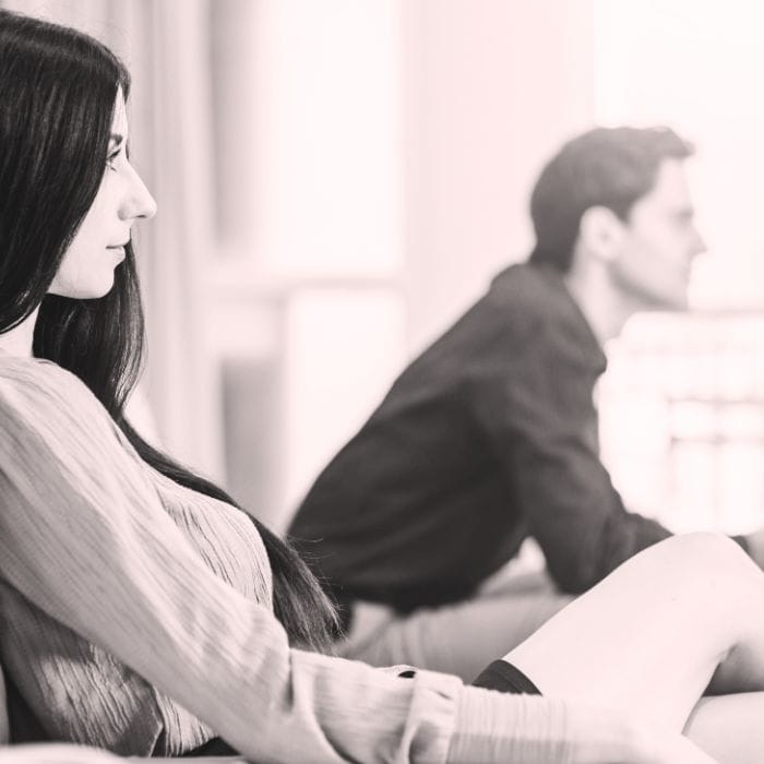 A woman looking confused and emotional, reflecting the mixed feelings that come with being in a situationship.